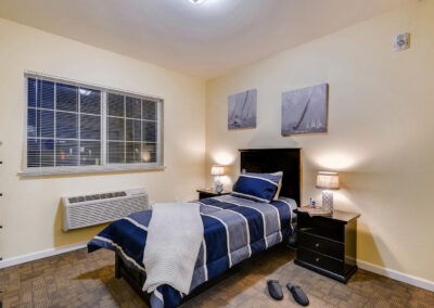 Assisted living and memory care bedroom in Wheat Ridge, CO
