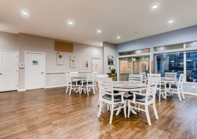 Memory care open-concept living and dining area in Centennial, CO